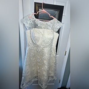 Beautiful tea cup length wedding dress with cap sleeves size 20